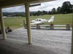 080.Colin Wade's new SR-20-G3 as seen from his deck at the Pauanui Beach airport (NZUN)