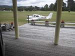 081.Colin Wade's new SR-20-G3 as seen from his deck at the Pauanui Beach airport (NZUN)